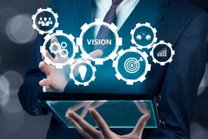 vision concept with man holding digital tablet